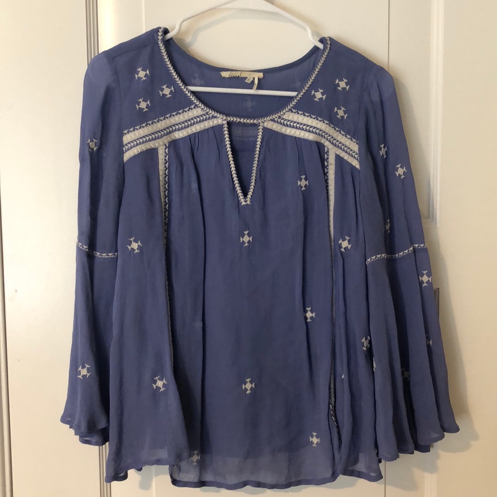 Blue embroidered top from Anthropologie